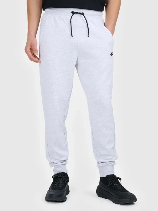 Spodnie męskie joggery jasny szary 4F : Kolor - Szary, Rozmiar odzieży - 2XL